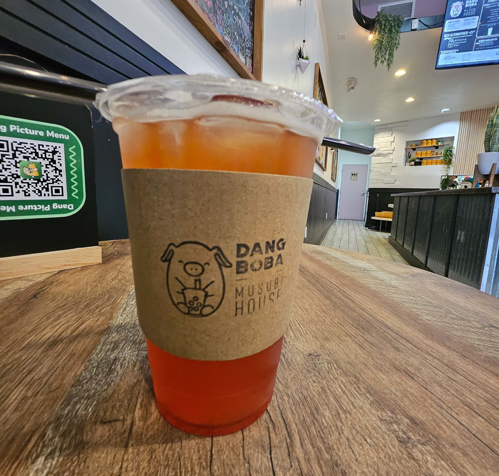 fruit tea in a clear plastic cup